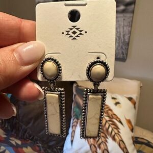 White and silver studded earrings/new